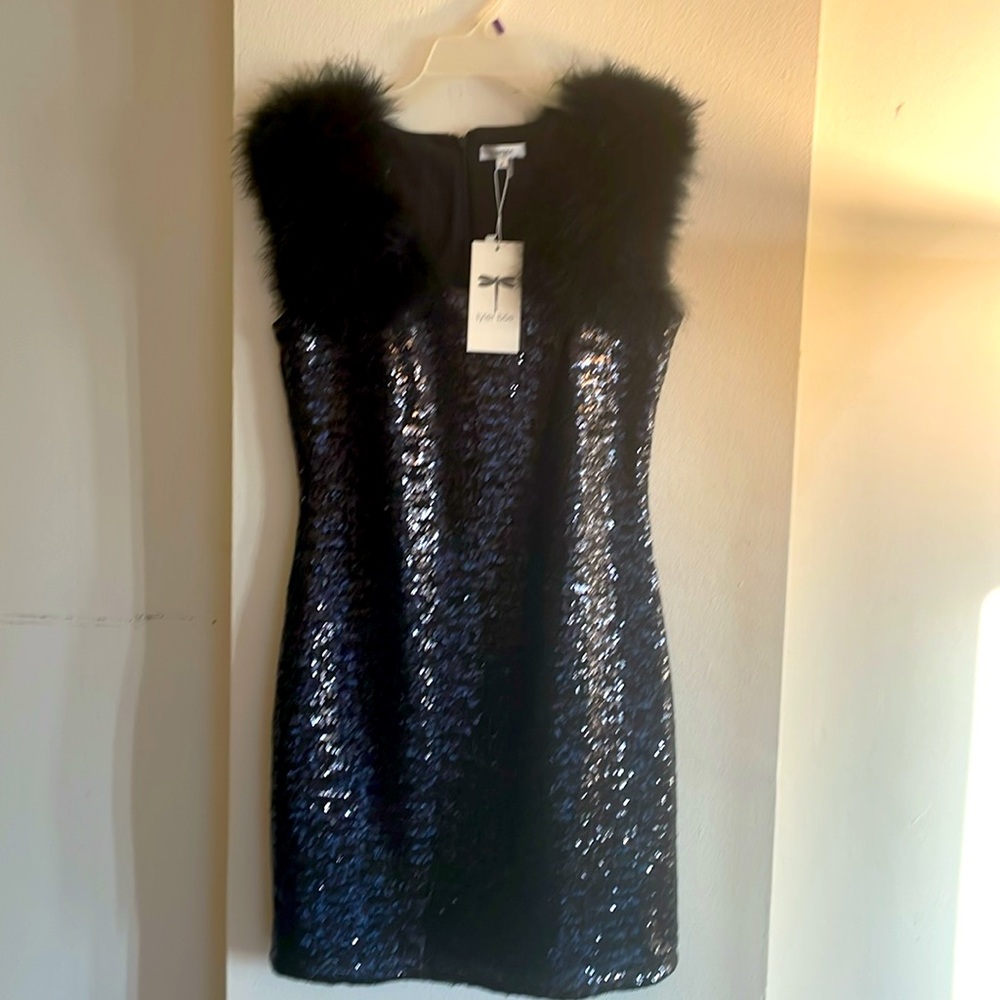 Tyler Boe Black Sequence Cocktail Dress with Fur embellishments.